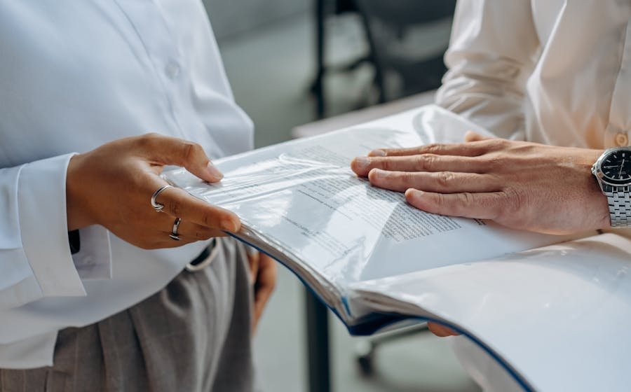 Professionals examining case documents